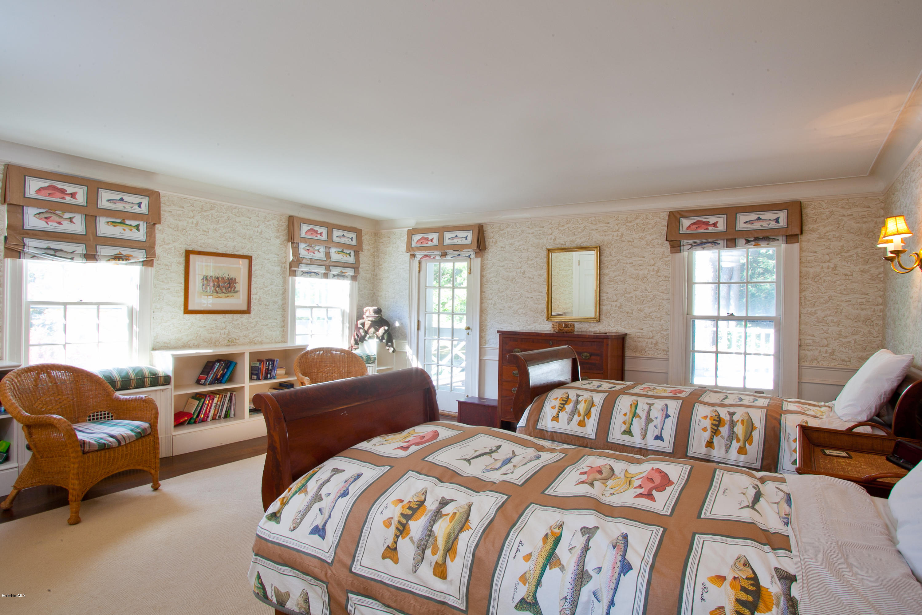 2 Brace Road Tyringham, MA 01264 - Photo 33 of 61 a bedroom with two beds and a couch next to a window