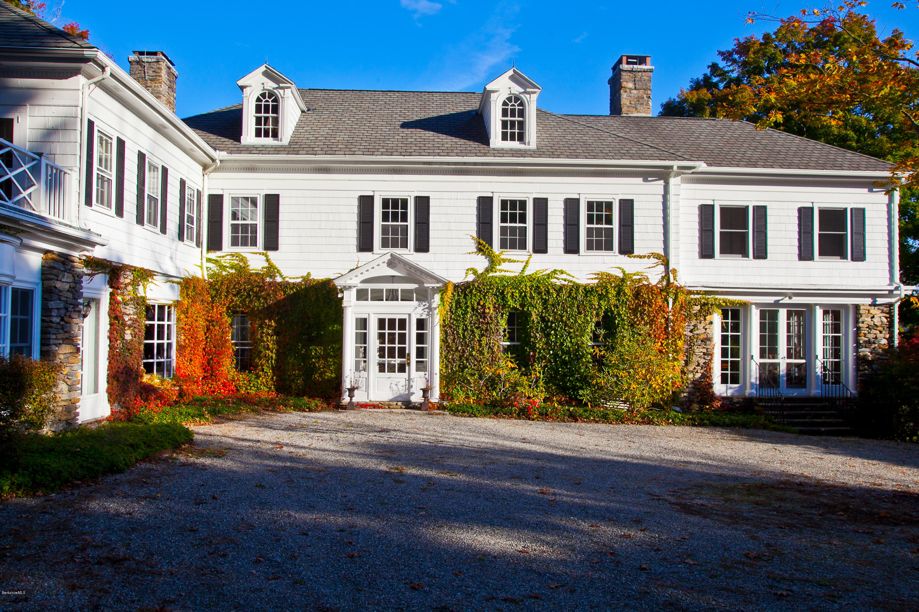 2 Brace Road Tyringham, MA 01264 - Photo 5 of 61 a front view of a house with a garden
