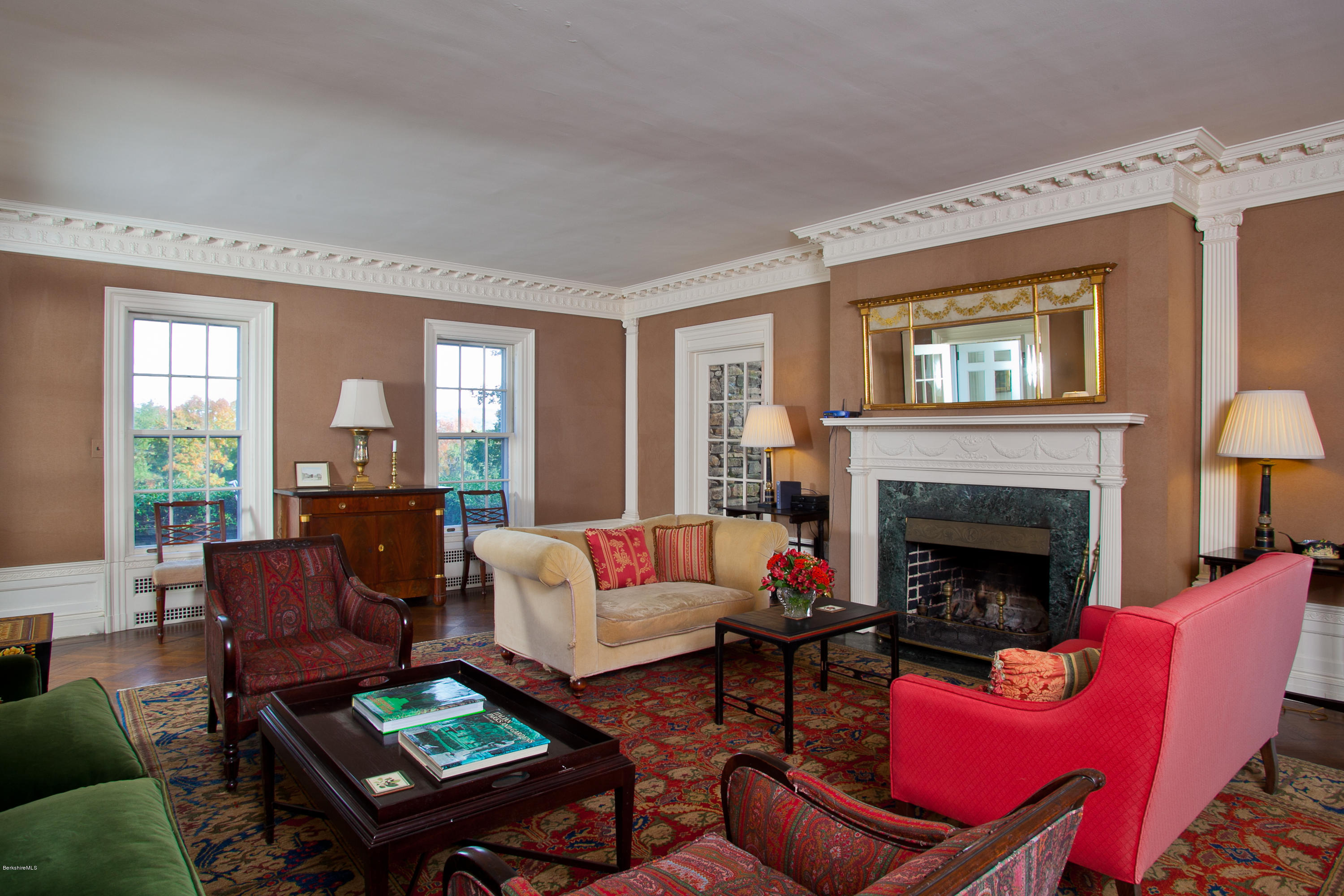 2 Brace Road Tyringham, MA 01264 - Photo 9 of 61 a living room with furniture fireplace and a table