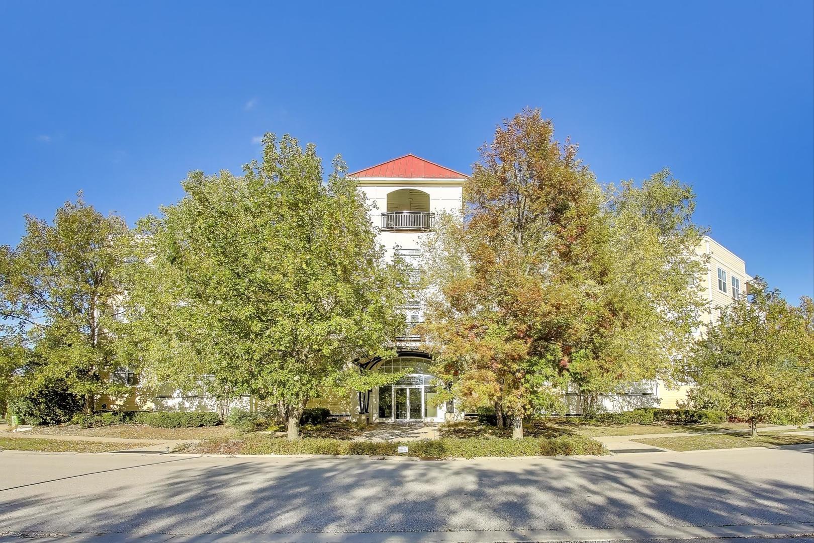 977 Harris Road, Unit 34 Grayslake, IL 60030 - Photo 1 of 27 a house view with a outdoor space