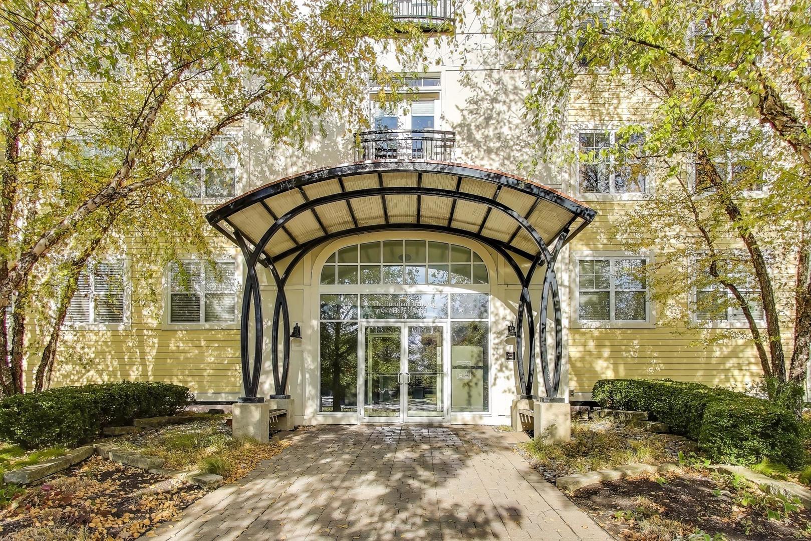 977 Harris Road, Unit 34 Grayslake, IL 60030 - Photo 2 of 27 a front view of a building