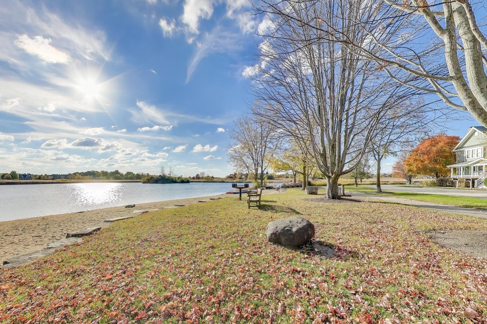 977 Harris Road, Unit 34 Grayslake, IL 60030 - Photo 22 of 27 a view of a lake with houses in the back