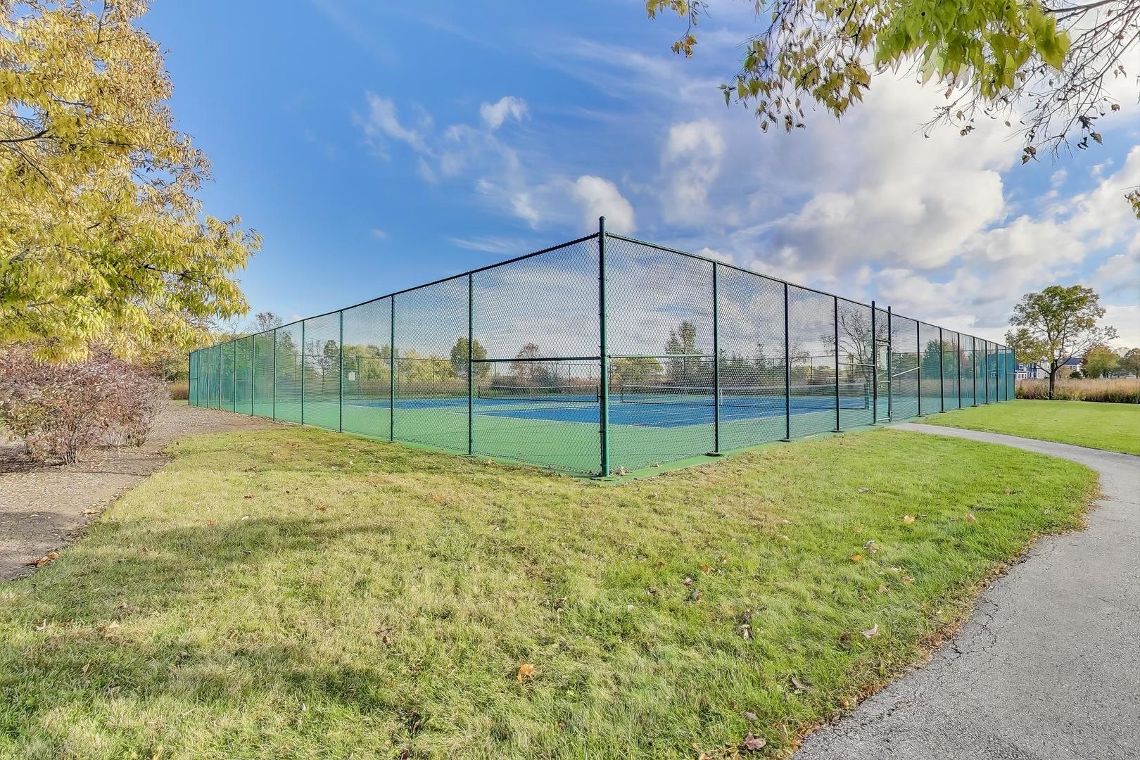 977 Harris Road, Unit 34 Grayslake, IL 60030 - Photo 24 of 27 a view of a backyard