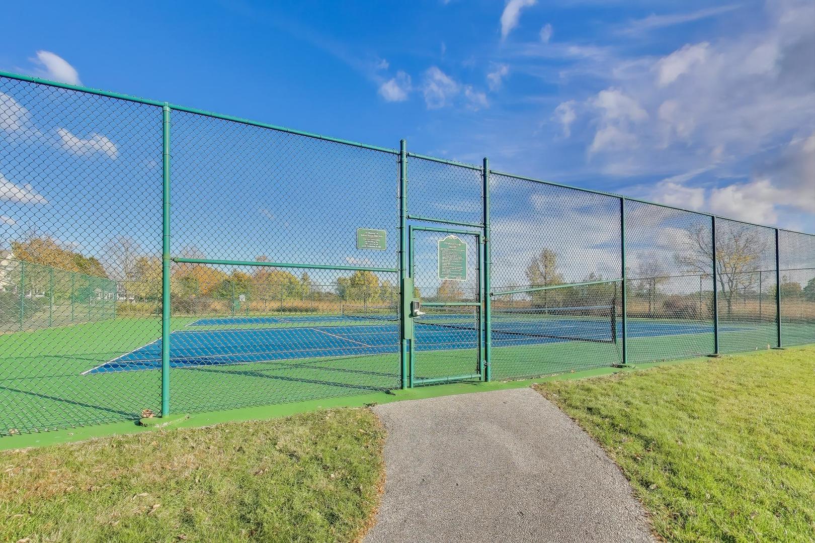 977 Harris Road, Unit 34 Grayslake, IL 60030 - Photo 25 of 27 a view of a backyard