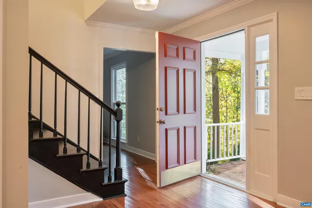 a view of an entryway with staircase