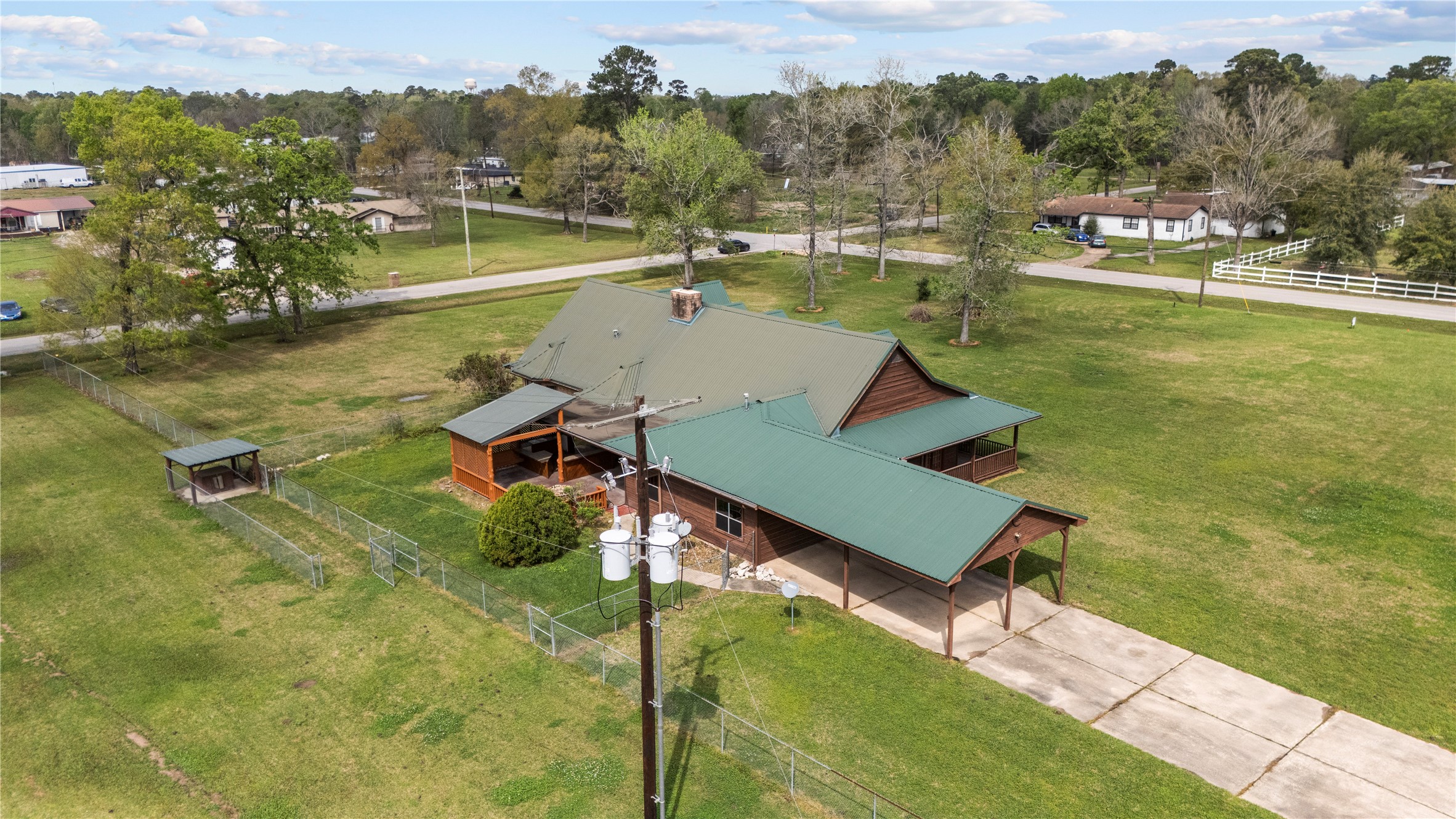 22916 East Martin Drive Porter, TX 77365 - Photo 41 of 43 a view of a lake with a yard