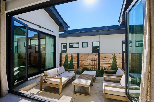 a bedroom with a bed and dressers