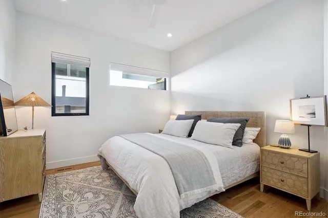 a kitchen with a sink a counter space and cabinets