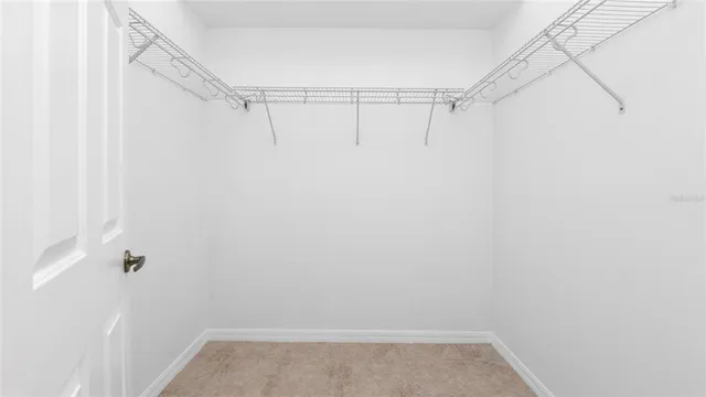 a view of a room with racks on the wall