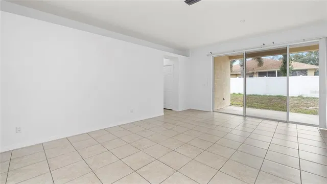 an aerial view of a house with outdoor space