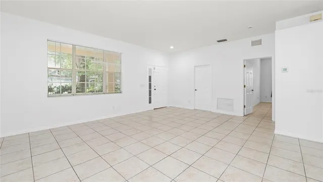 an empty room with windows