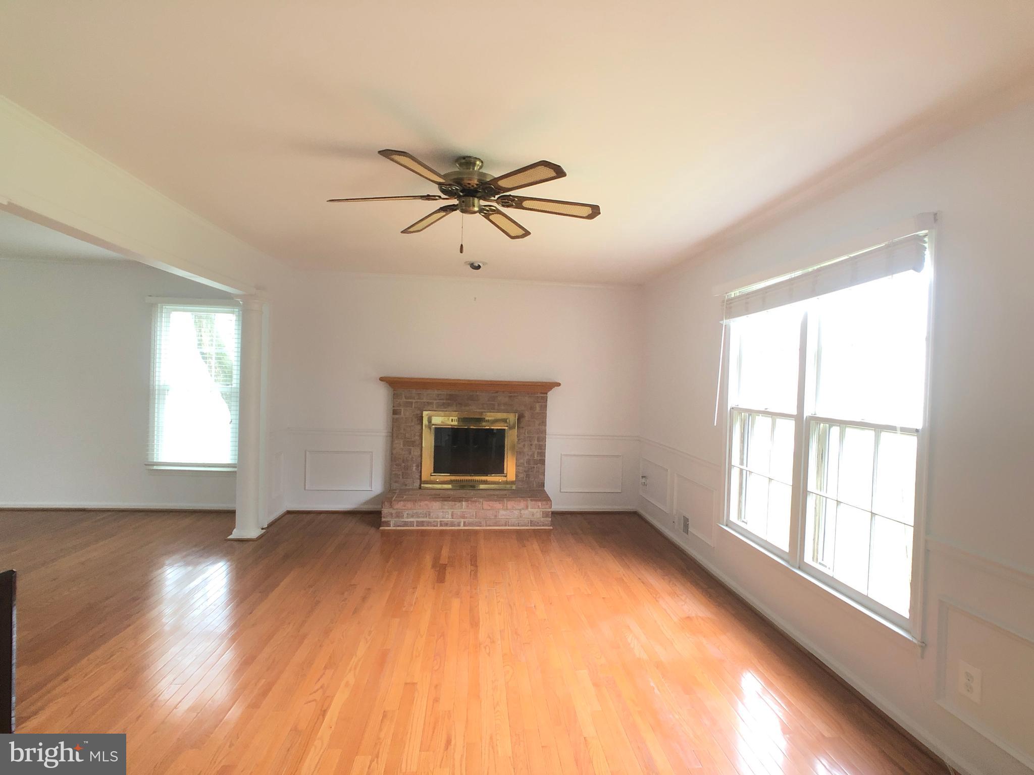 51 Treworthy Road Gaithersburg, MD 20878 - Photo 7 of 34 Family room with fireplace