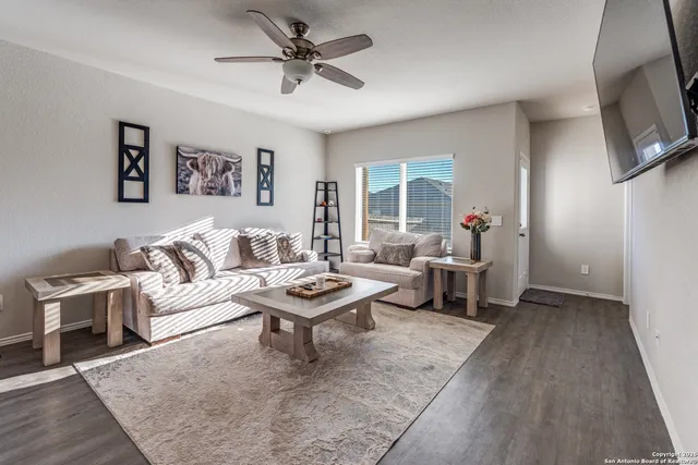 a living room with furniture and a couch