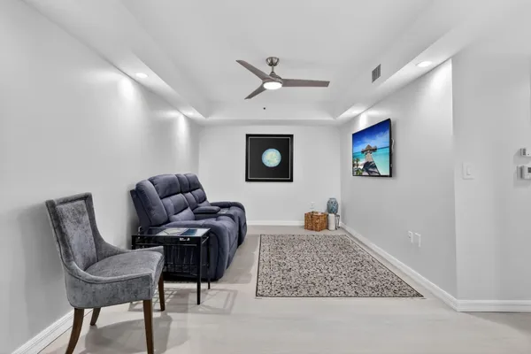 a living room with furniture and a couch