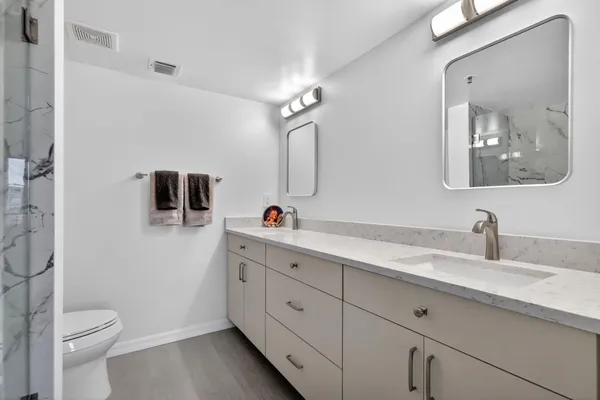 a view of a city with tall buildings