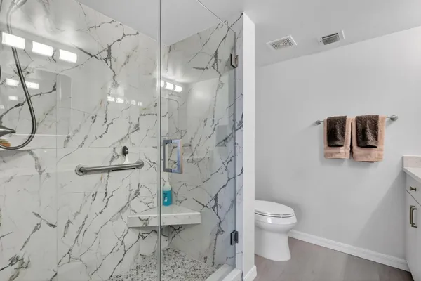 an aerial view of a house with swimming pool outdoor seating and yard