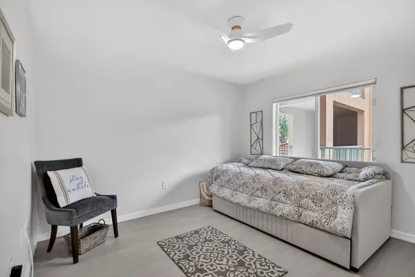 an aerial view of a house with yard