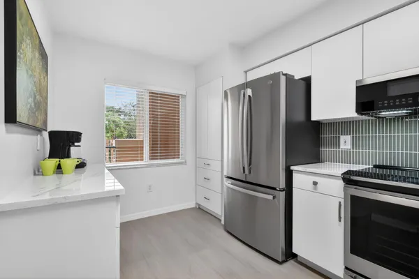 a view of a dining room with furniture