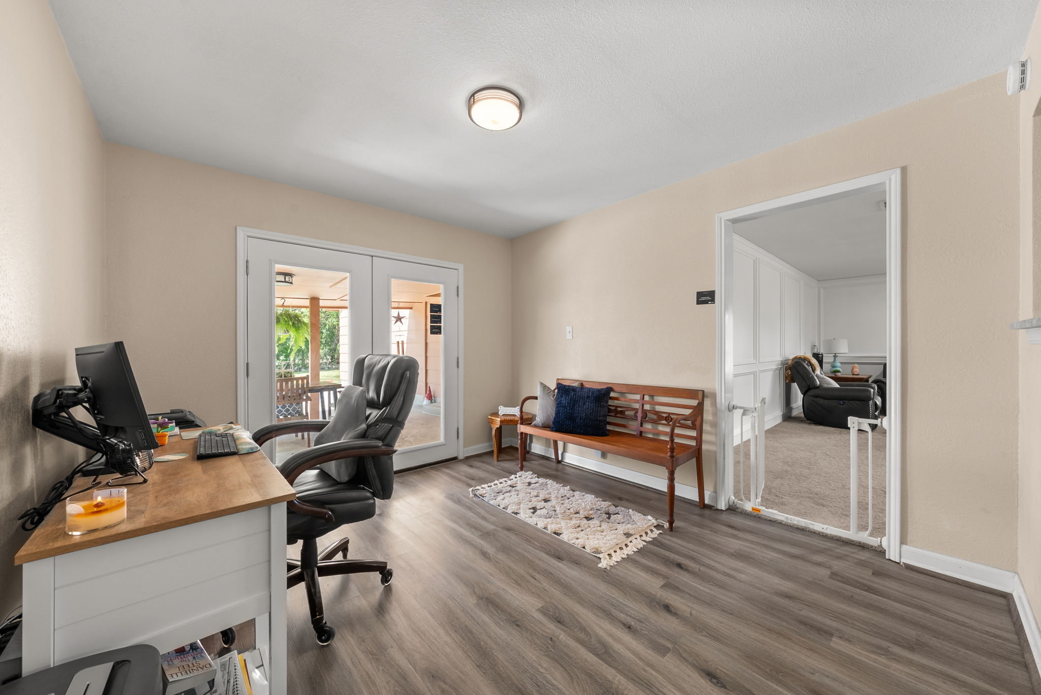 2702 Double Tree Street Round Rock, TX 78681 - Photo 13 of 40 a living room with furniture a wooden floor and a large window