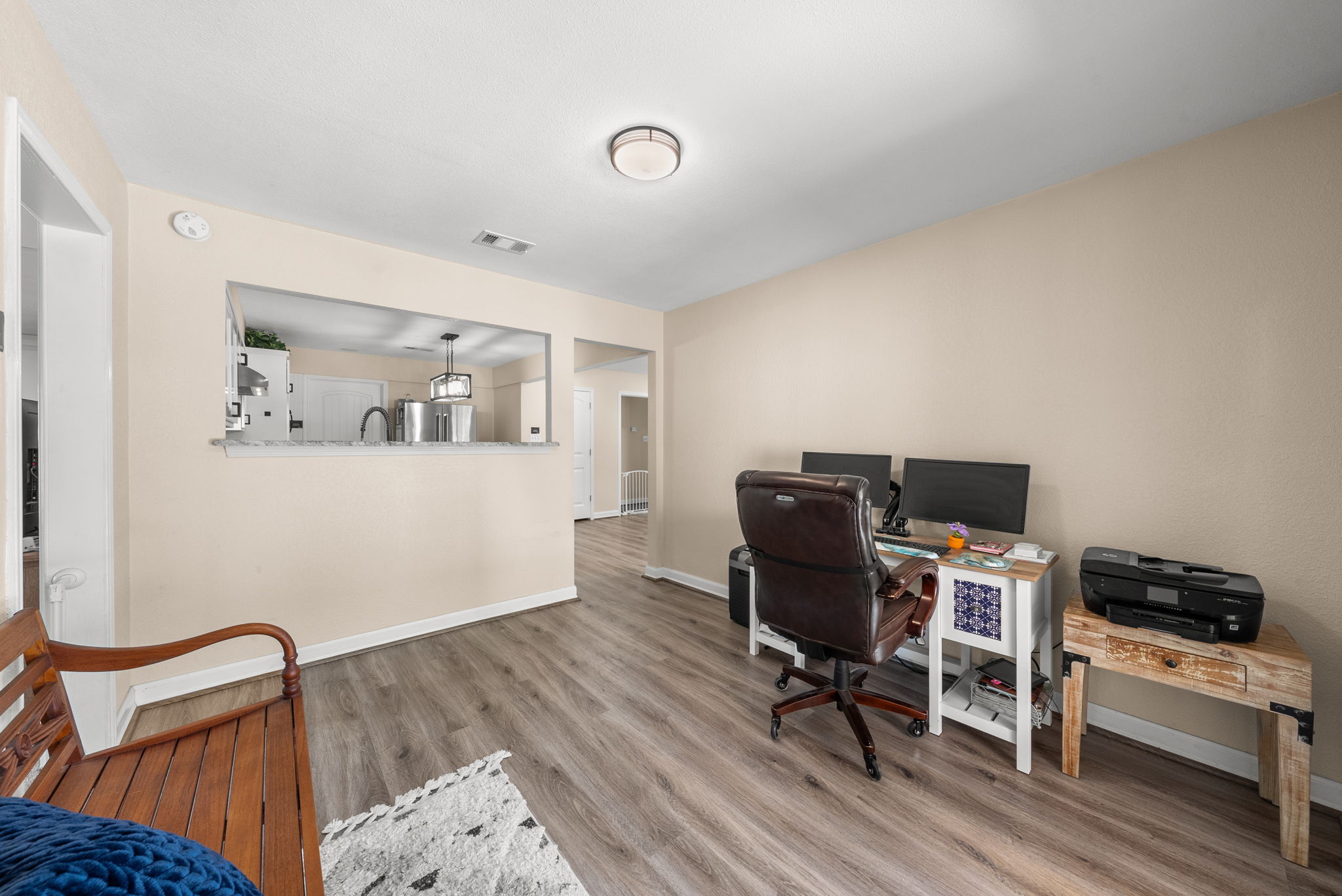 2702 Double Tree Street Round Rock, TX 78681 - Photo 14 of 40 a workspace with furniture and wooden floor