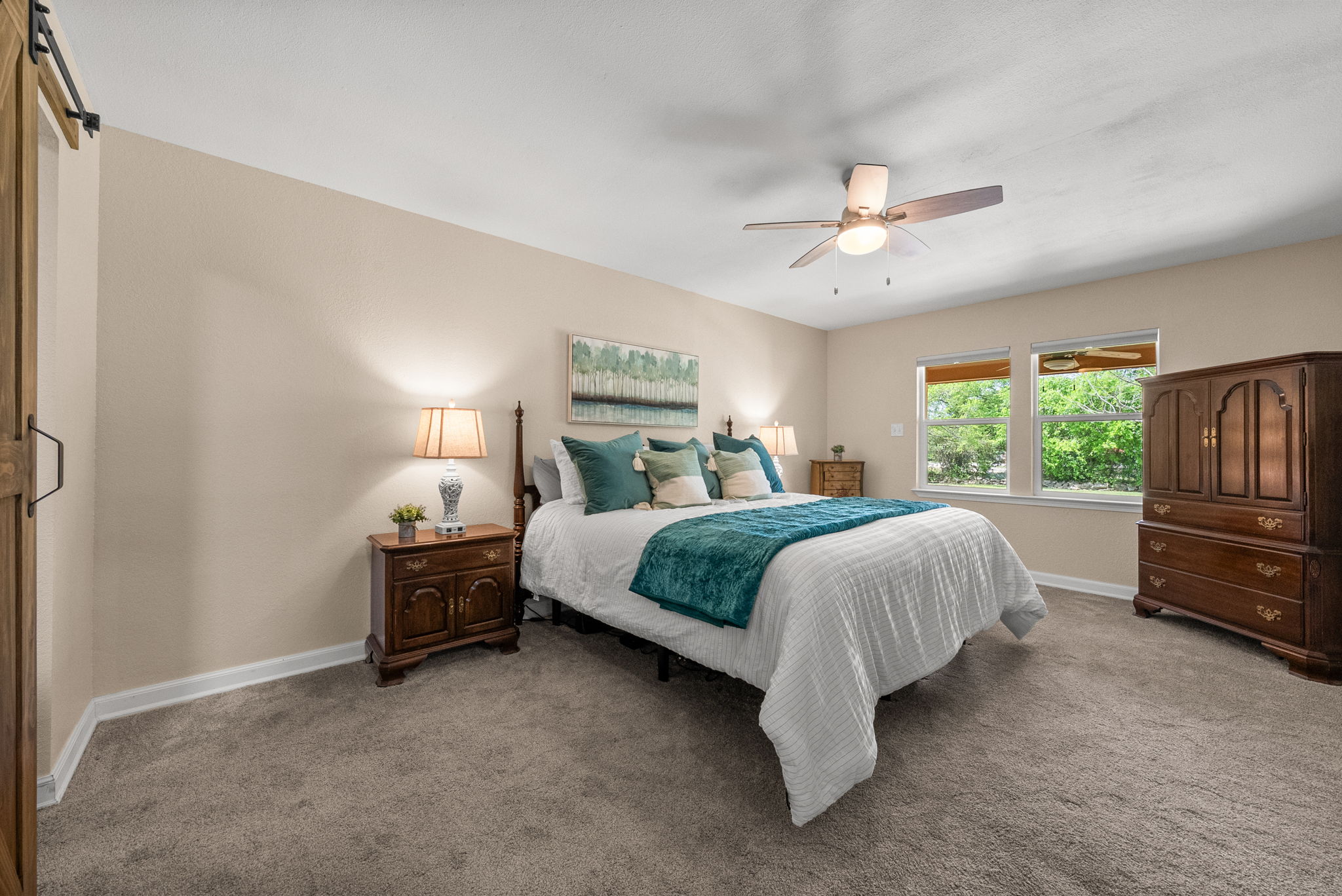2702 Double Tree Street Round Rock, TX 78681 - Photo 17 of 40 a bedroom with a bed dresser and a window