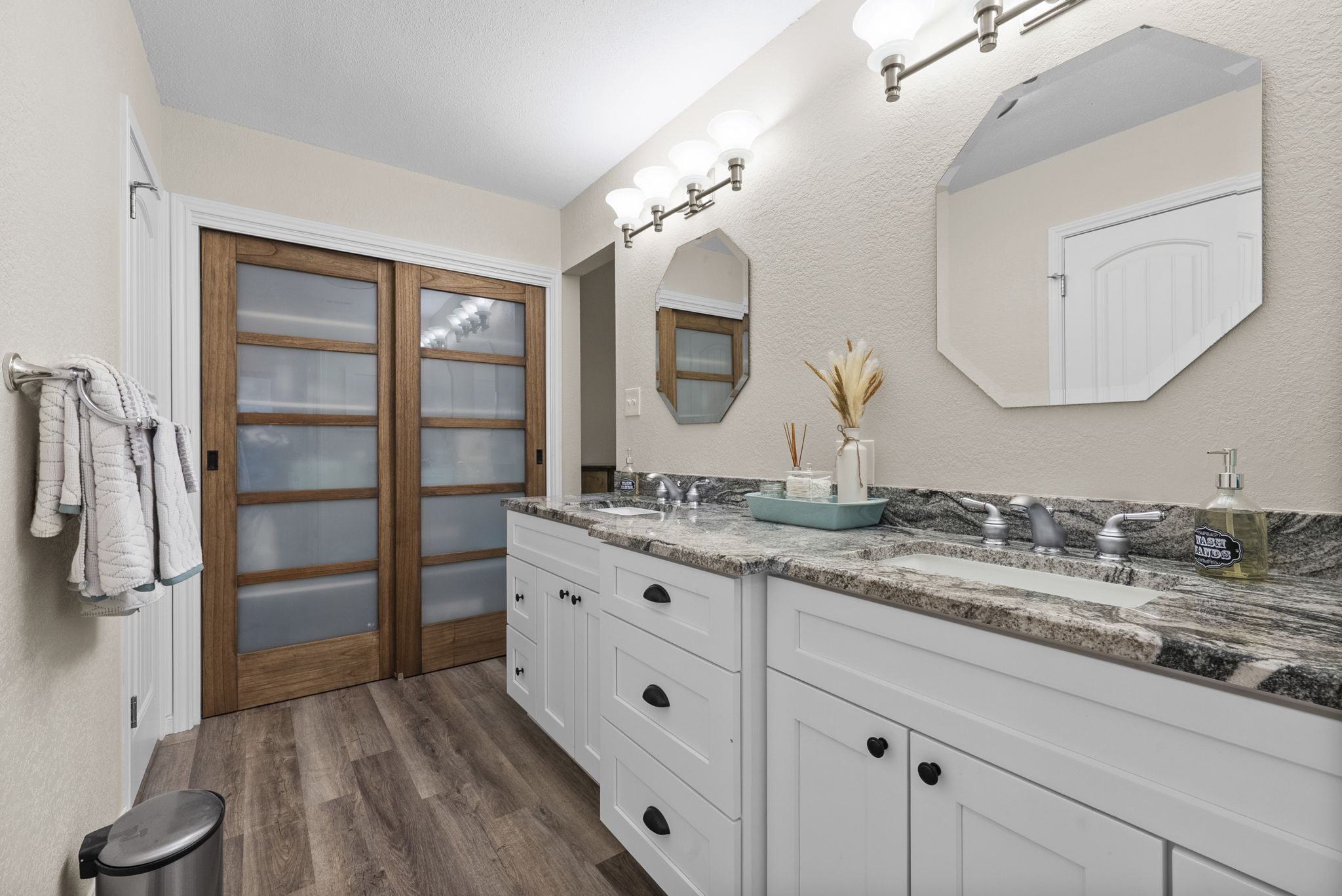 2702 Double Tree Street Round Rock, TX 78681 - Photo 18 of 40 a bathroom with a double vanity sink and a mirror