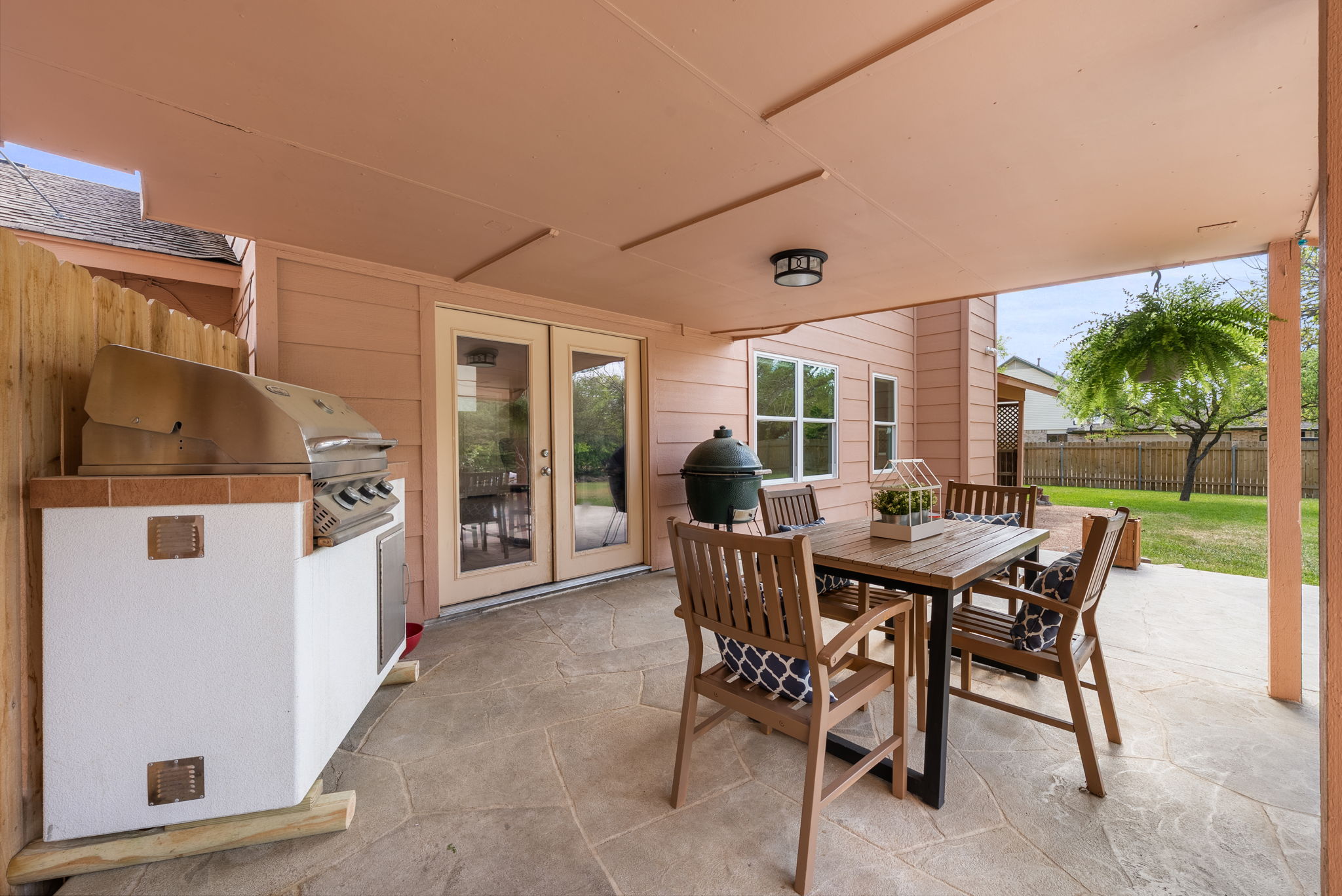 2702 Double Tree Street Round Rock, TX 78681 - Photo 26 of 40 a view of a dining room with furniture and a garden