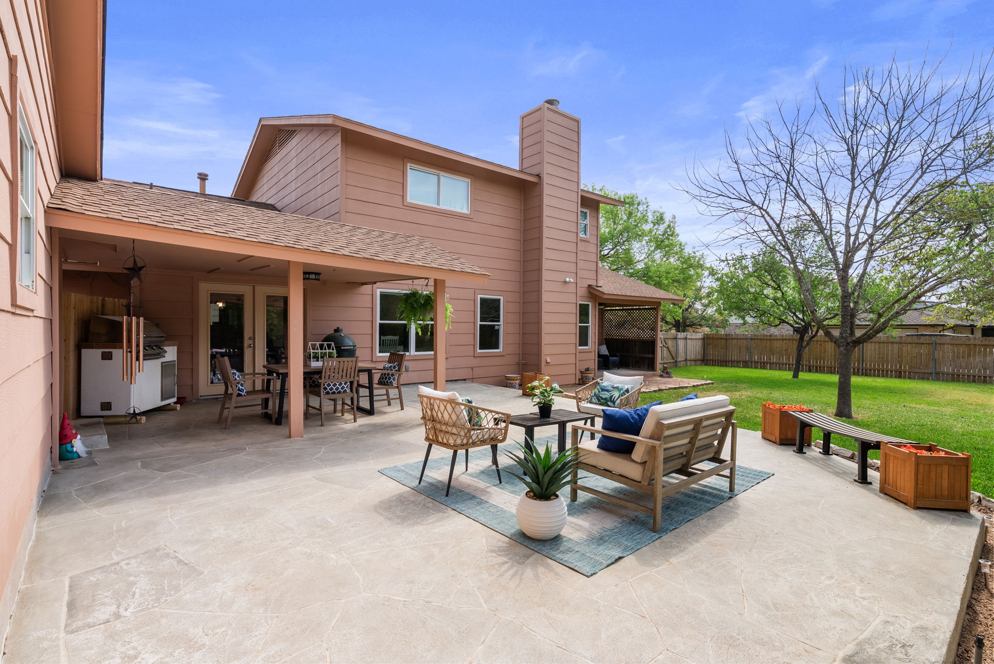 2702 Double Tree Street Round Rock, TX 78681 - Photo 27 of 40 a view of a house with backyard sitting area and garden