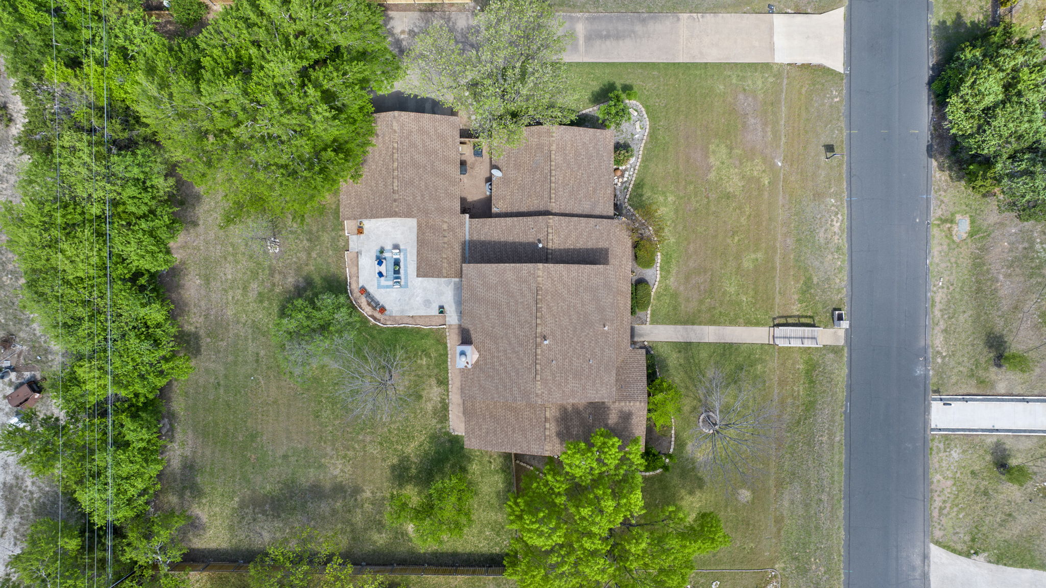 2702 Double Tree Street Round Rock, TX 78681 - Photo 34 of 40 an aerial view of a house with a yard and large tree