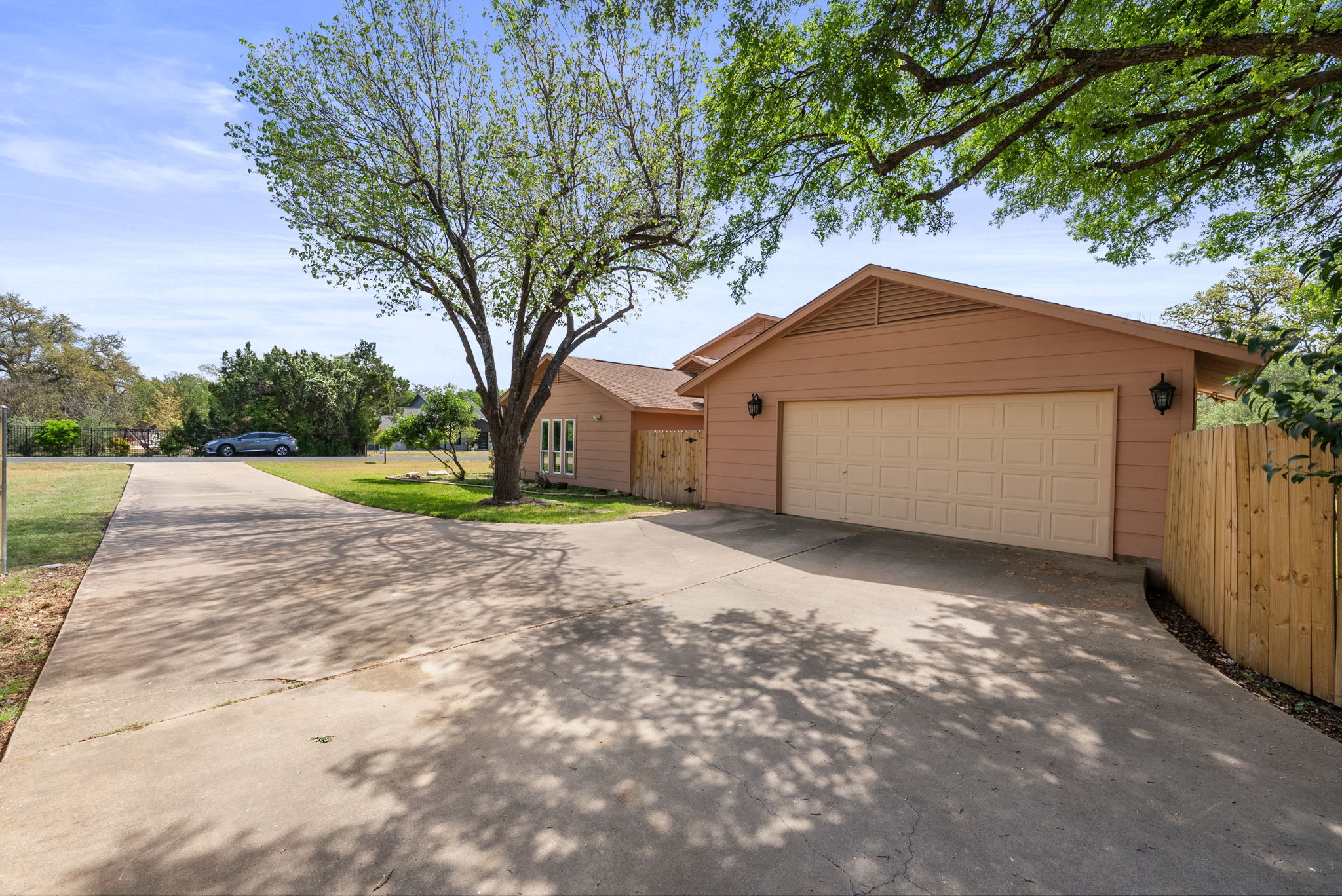 2702 Double Tree Street Round Rock, TX 78681 - Photo 39 of 40 a front view of a house with a yard and garage