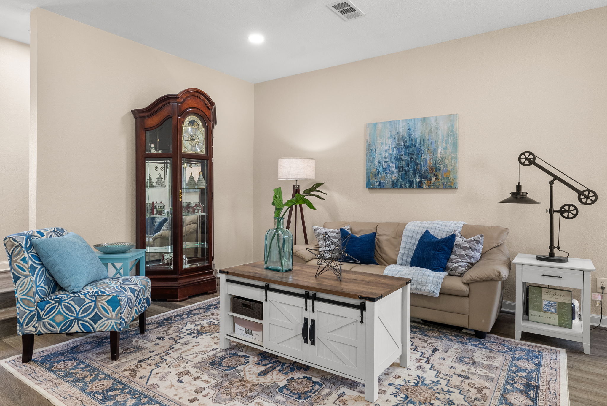 2702 Double Tree Street Round Rock, TX 78681 - Photo 10 of 40 a living room with furniture and wooden floor