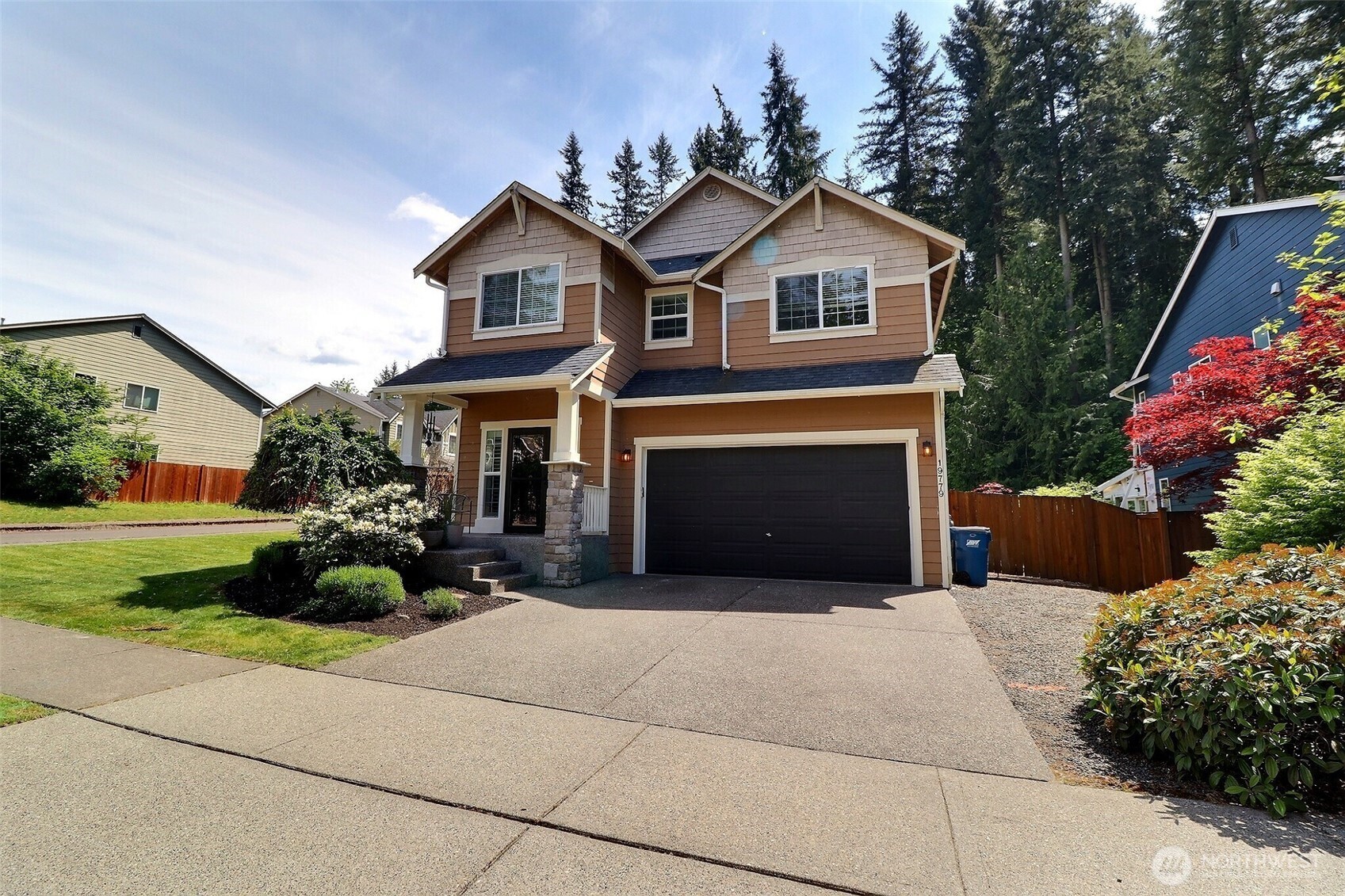 19776 Mountain Ridge Road Southeast Monroe, WA 98272 - Photo 39 of 40 a front view of a house with garden