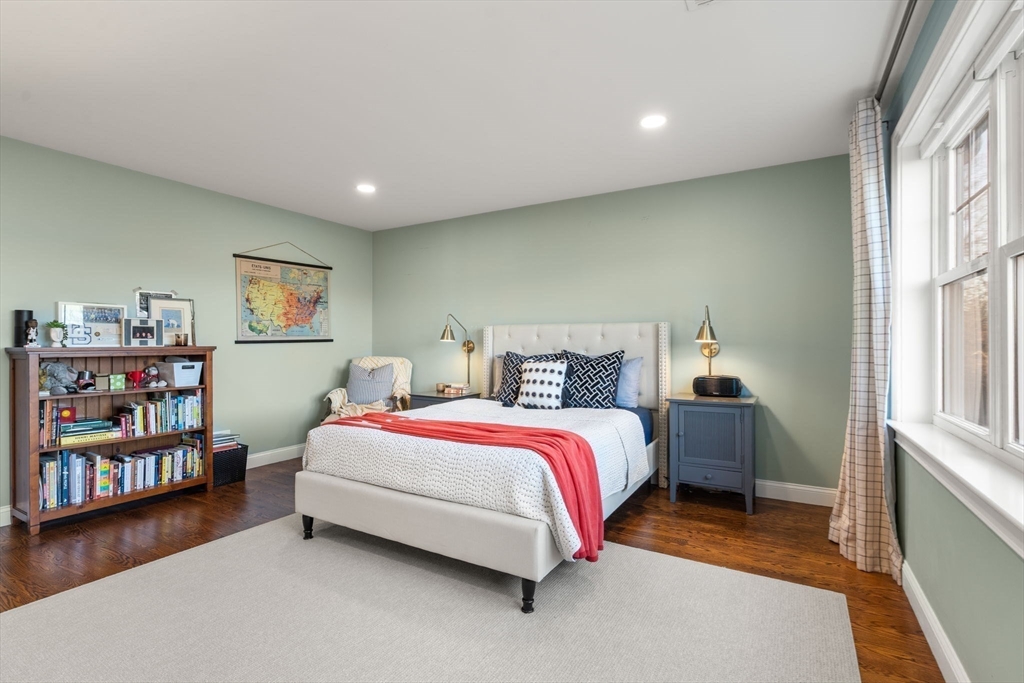 22 Sunset Way, Unit 22 Medfield, MA 02052 - Photo 22 of 42 a spacious bedroom with a bed and a window