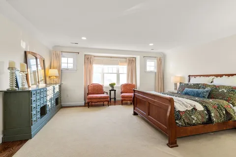 a bed room with a bed and a couch