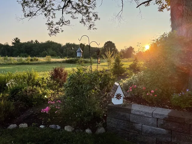 a house view with a lake view