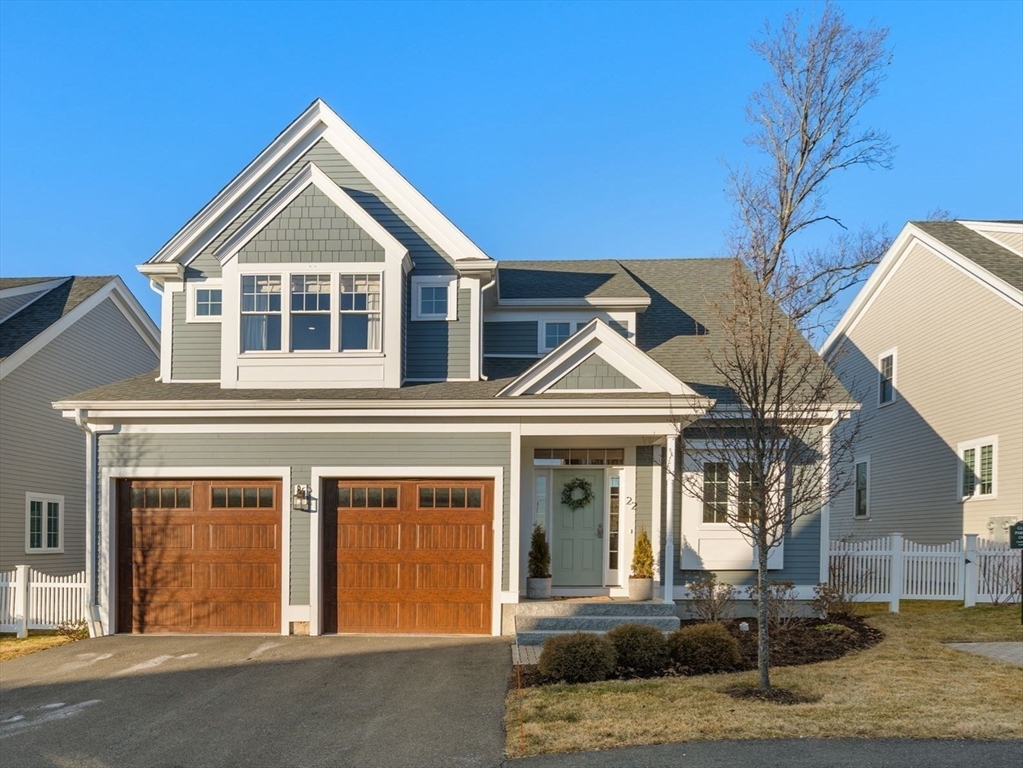 22 Sunset Way, Unit 22 Medfield, MA 02052 - Photo 4 of 42 a front view of a house with garden