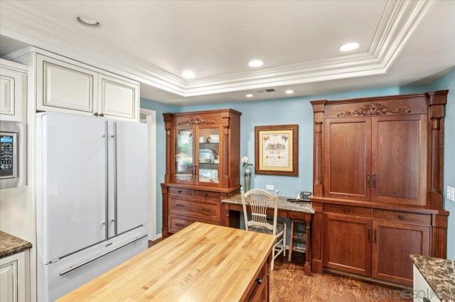 a view of a patio with swimming pool table and chairs