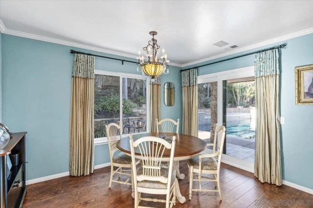 a outdoor living space with patio furniture and a fireplace