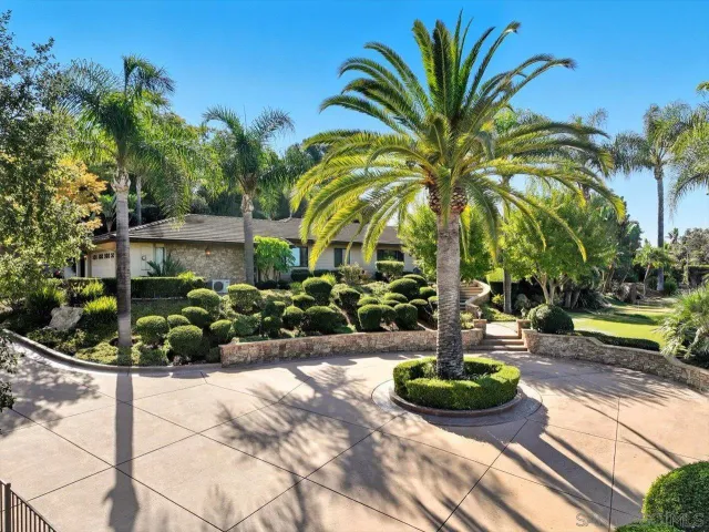 a view of a livingroom with furniture and front door