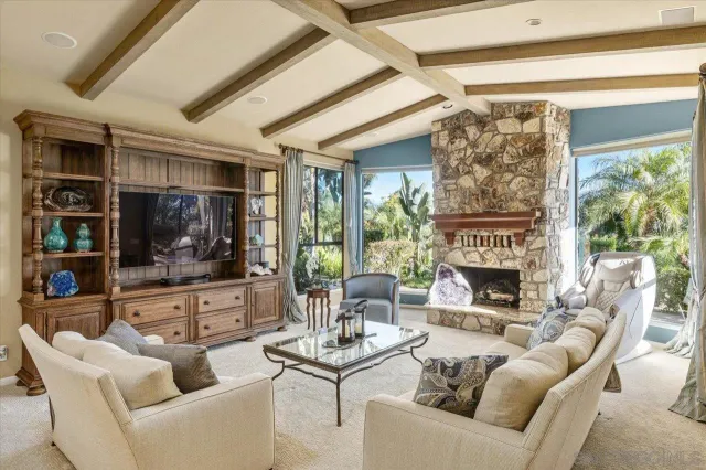 a kitchen with stainless steel appliances granite countertop a stove and a microwave