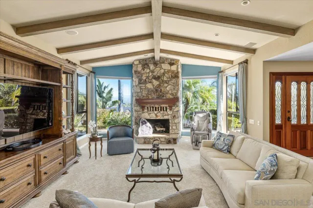 a kitchen with a stove a sink and a refrigerator