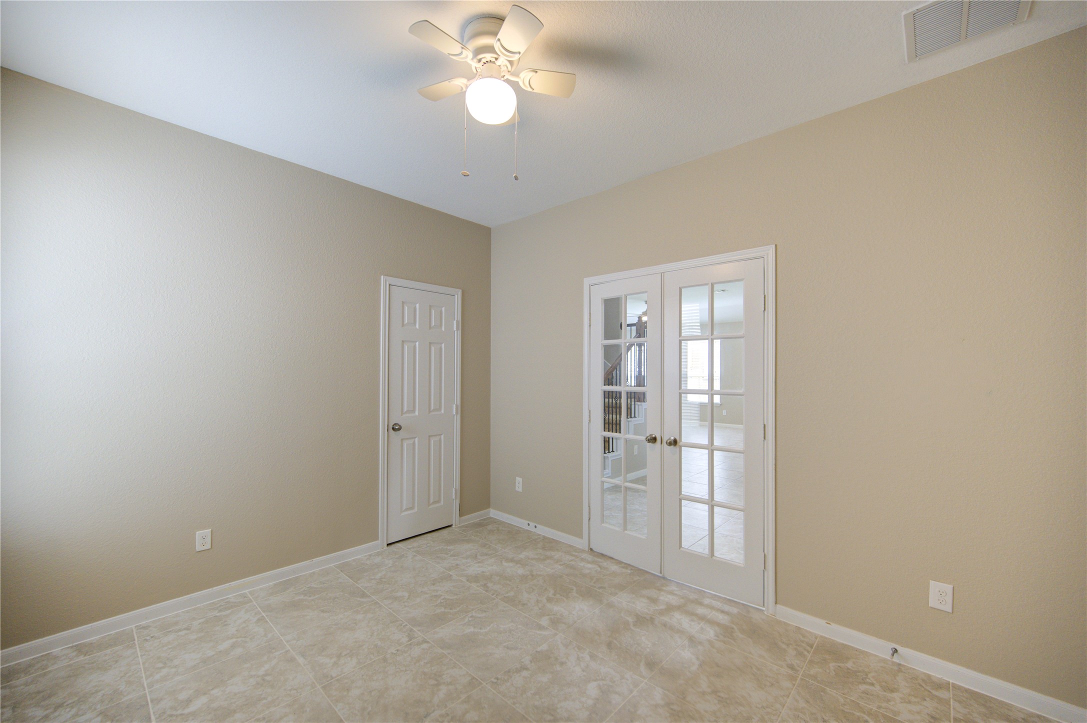 6014 Watford Bend Rosenberg, TX 77471 - Photo 11 of 18 14 – Unstaged view of the fourth bedroom, perfect for office, nursery, or creative space.