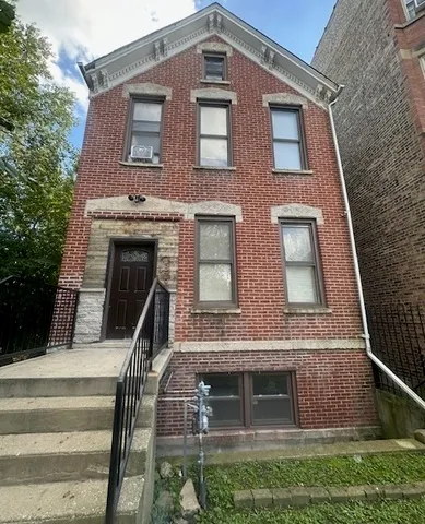 a front view of a house with glass windows