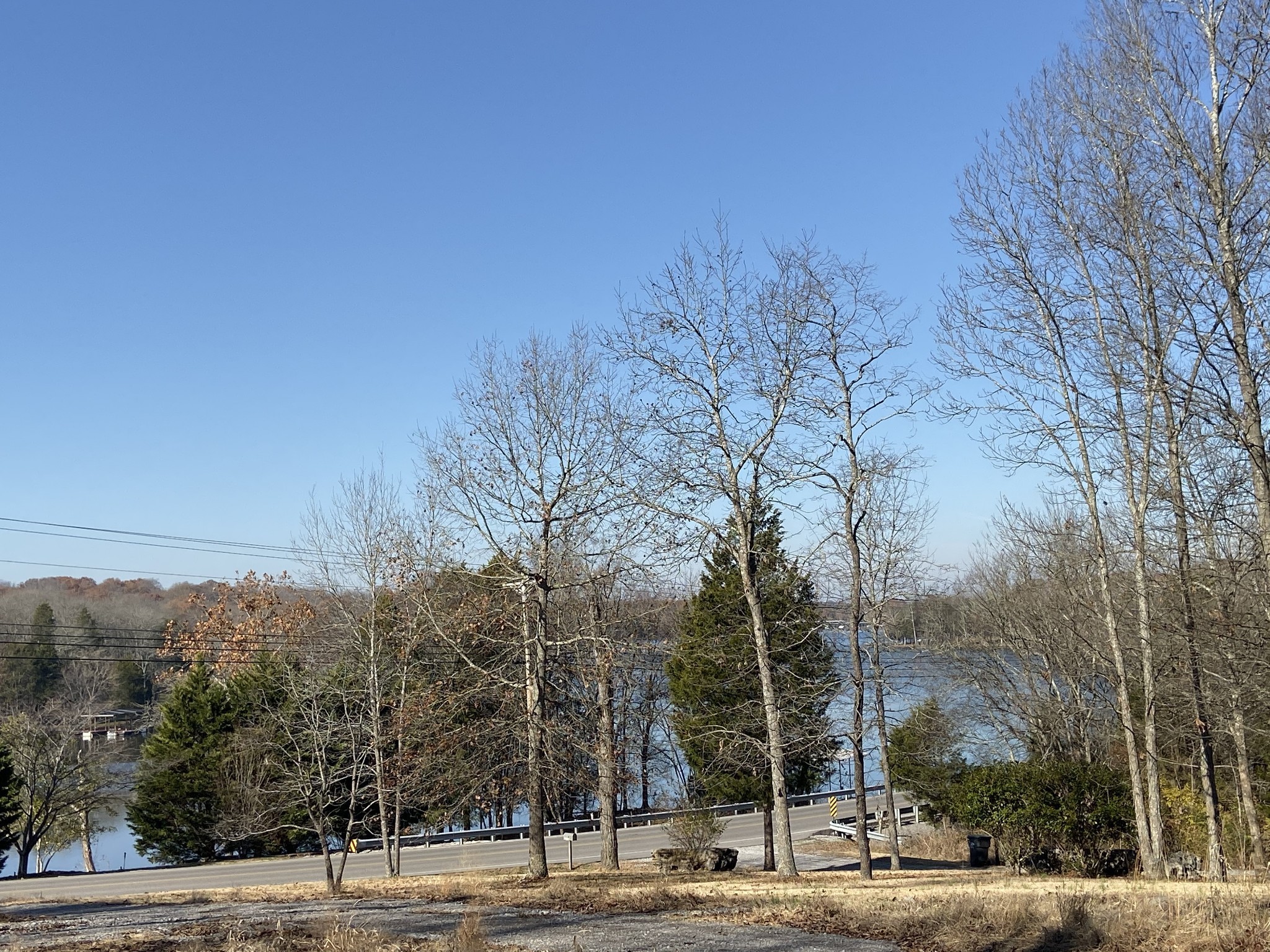 2390 Benders Ferry Road Mount Juliet, TN 37122 - Photo 11 of 12 a view of a road with a trees