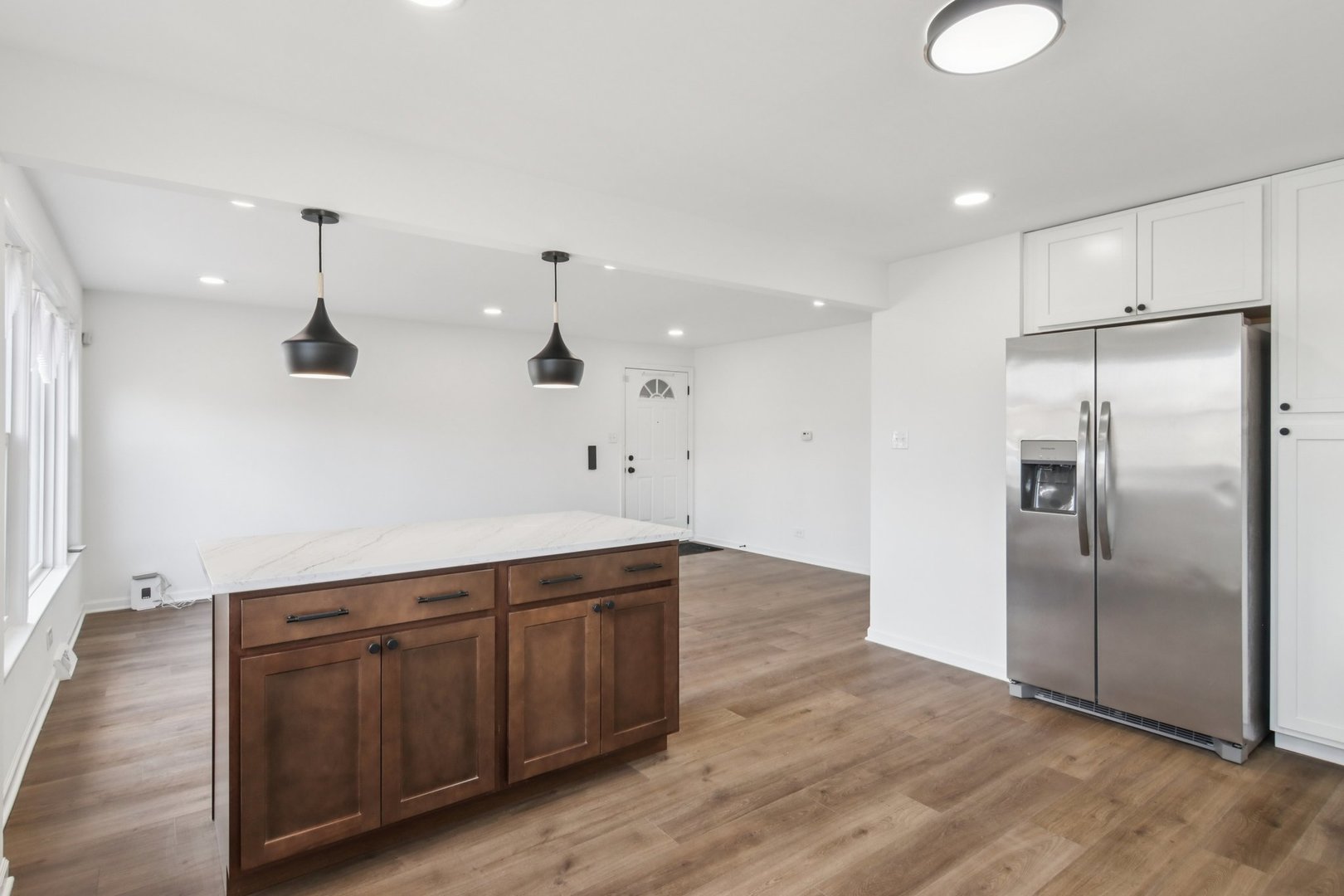 8630 South Indiana Avenue Chicago, IL 60619 - Photo 13 of 33 a kitchen with a refrigerator and a sink