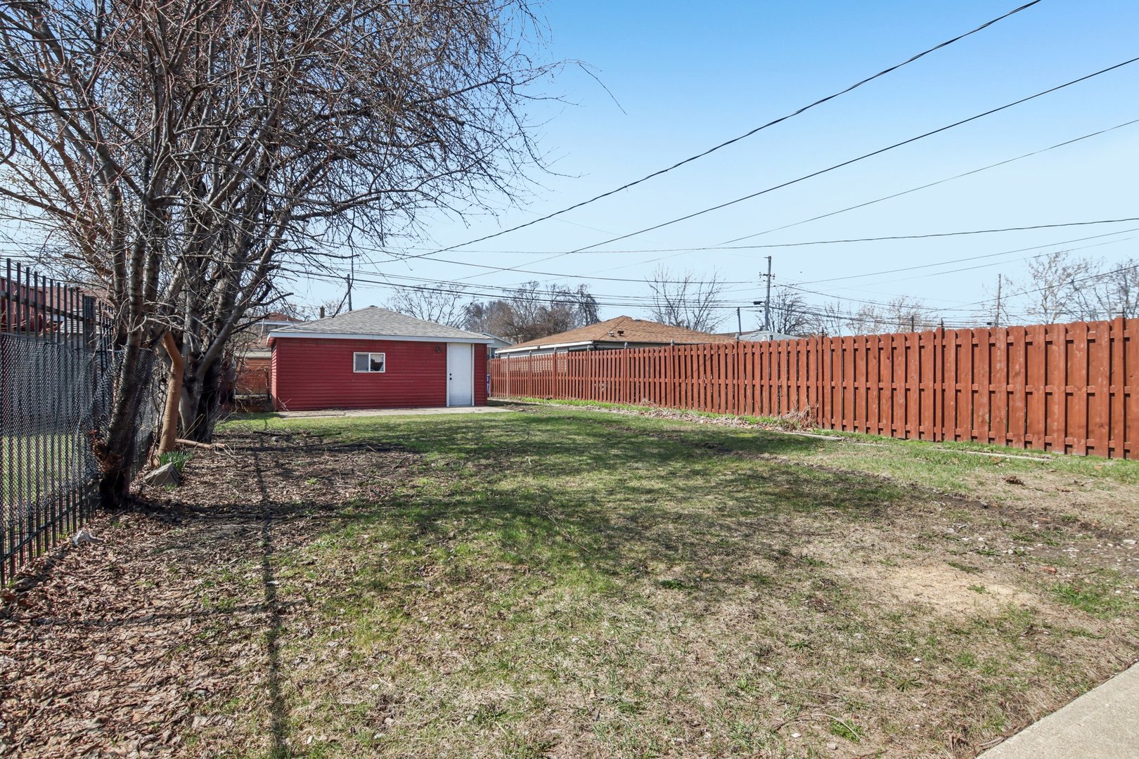 8630 South Indiana Avenue Chicago, IL 60619 - Photo 29 of 33 a front view of a house with garden