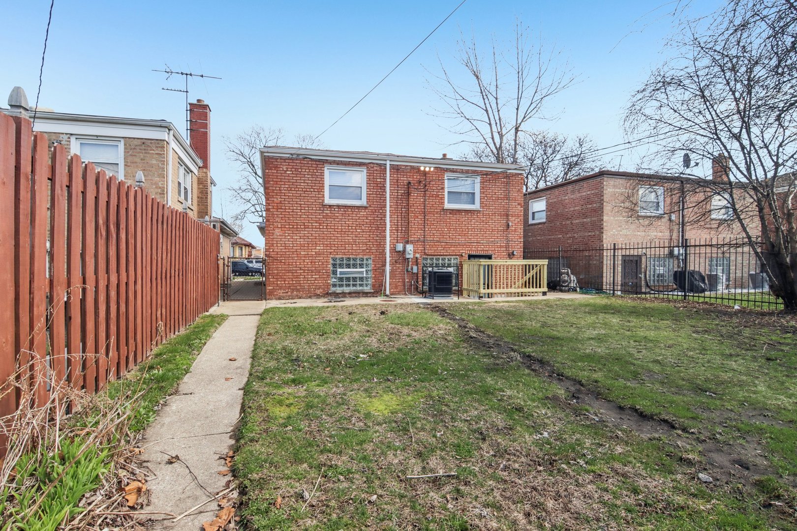 8630 South Indiana Avenue Chicago, IL 60619 - Photo 32 of 33 a front view of a house with garden