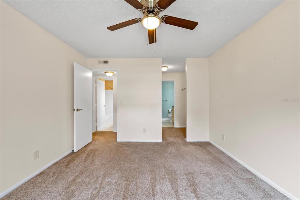 1550 South Belcher Road, Unit 223 Clearwater, FL 33764 - Photo 17 of 38 a view of an empty room and kitchen view
