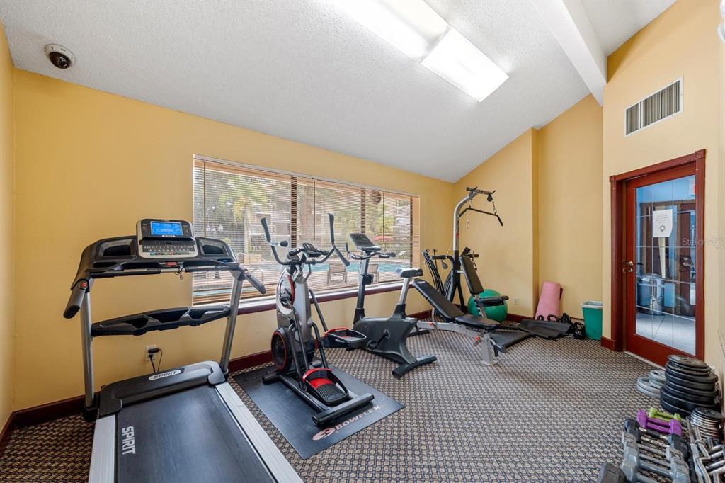 1550 South Belcher Road, Unit 223 Clearwater, FL 33764 - Photo 26 of 38 a view of a room with gym equipment