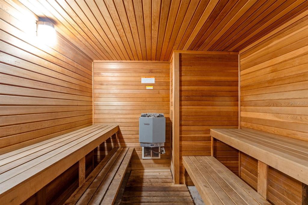 1550 South Belcher Road, Unit 223 Clearwater, FL 33764 - Photo 27 of 38 a view of a balcony with wooden floor and outdoor seating